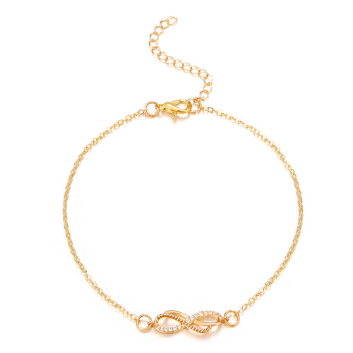 Gold bracelet with an infinity symbol on a white background