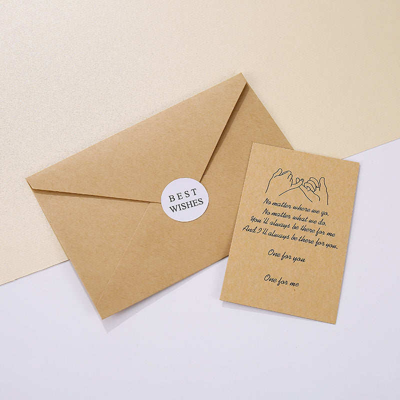 Kraft paper envelope with a matching card on a light background