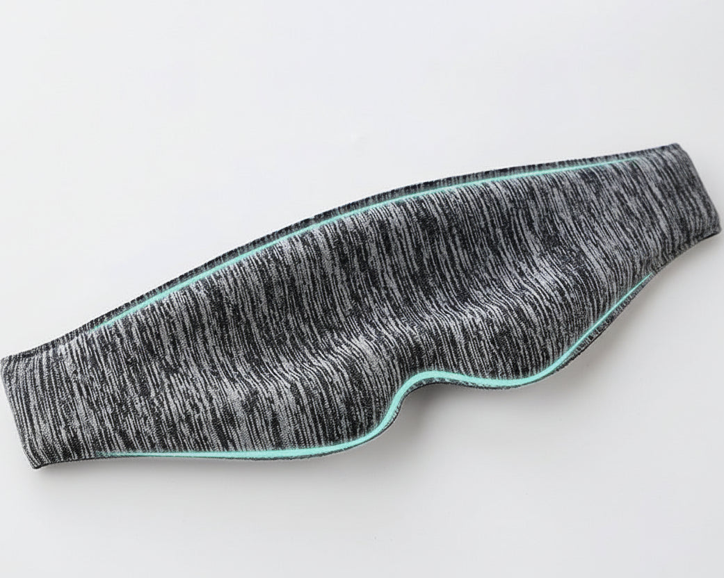 Textured material sample with wavy pattern on a light gray background