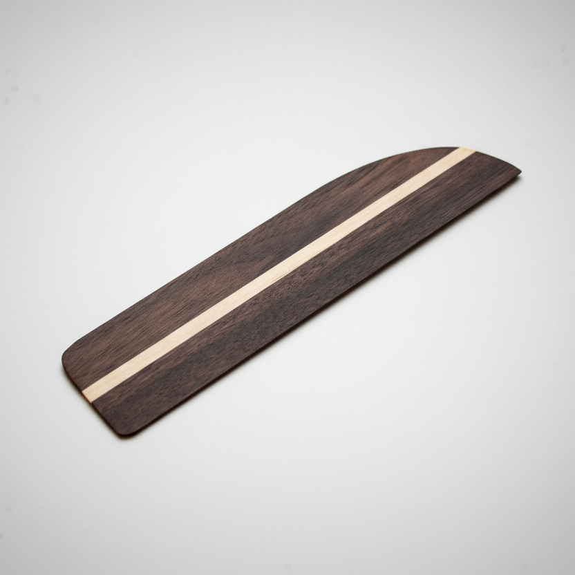Wooden cutting board with a stripe on a gray background