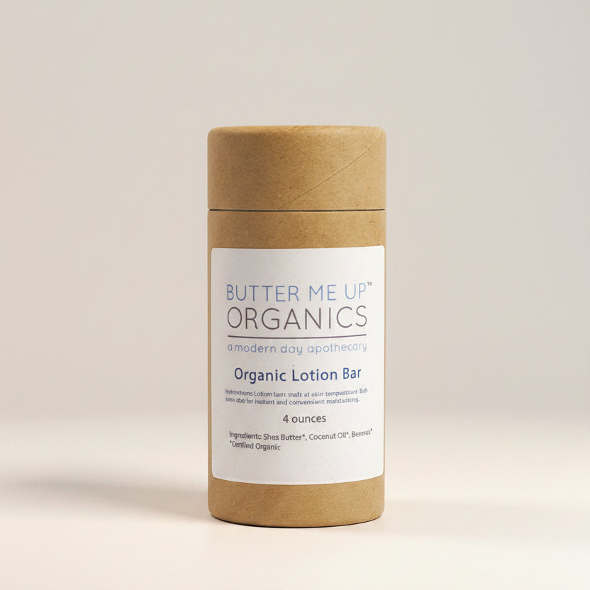 Butter Me Up Organics organic lotion bar with eucalyptus leaves on a white background