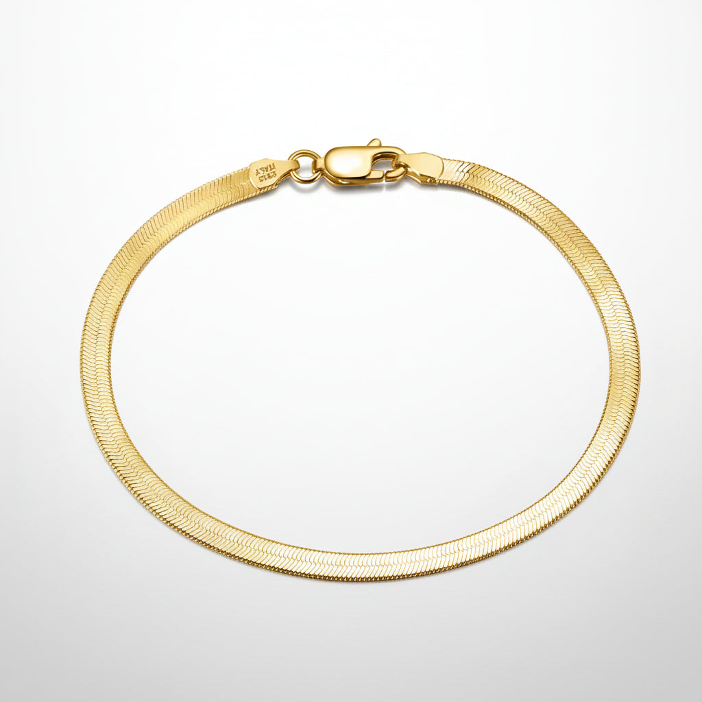 Gold bracelet on a white background