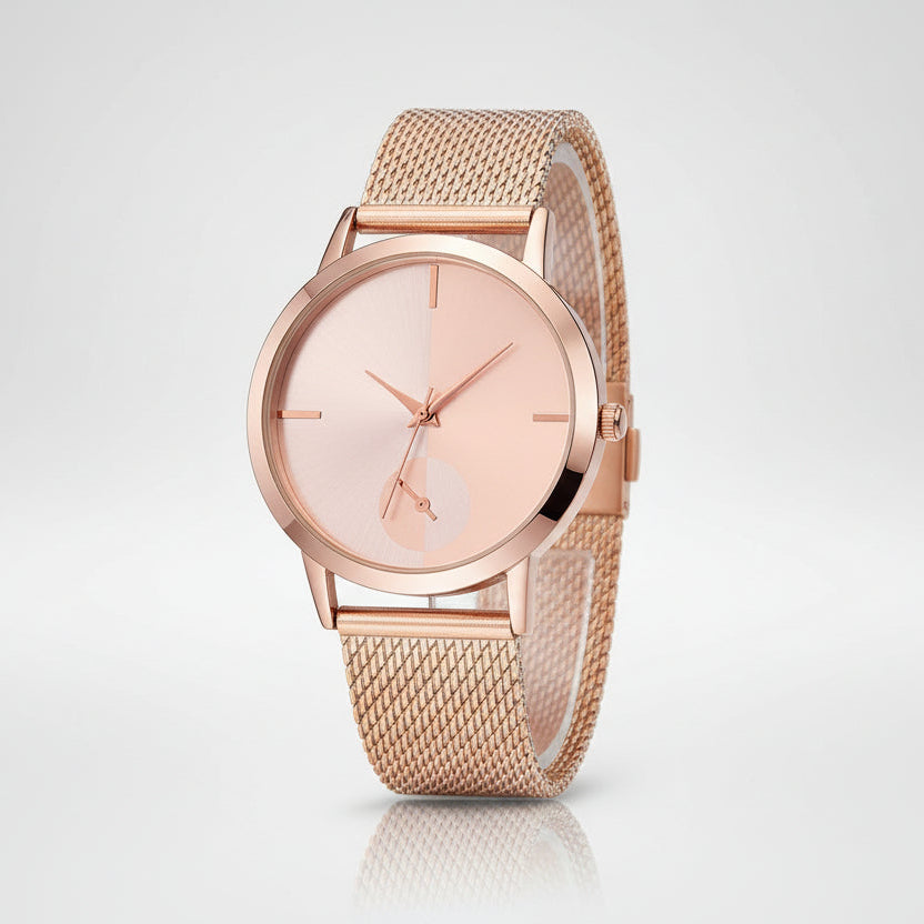 Rose gold watch with a mesh band on a white background