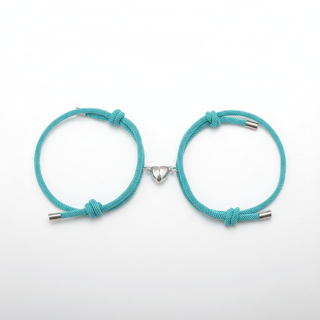 Two turquoise bracelets with metal clasps on a white background.