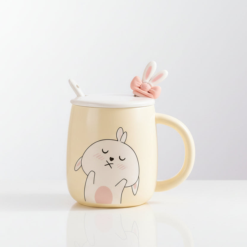 Mug with a rabbit design on a desk with office supplies