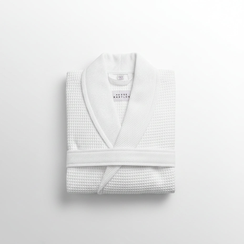 White textured robe with 'House of Babylon' label on a white background