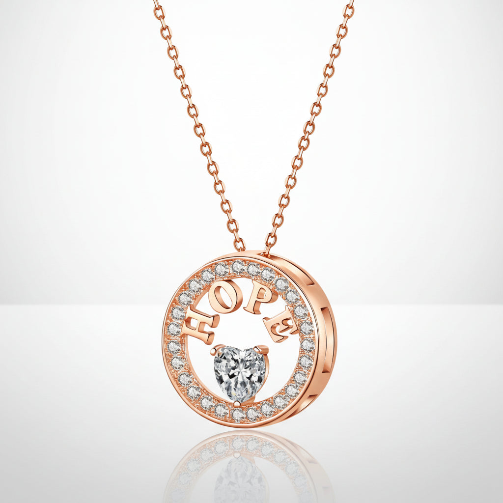 Rose gold necklace with 'HOPE' pendant on a white background