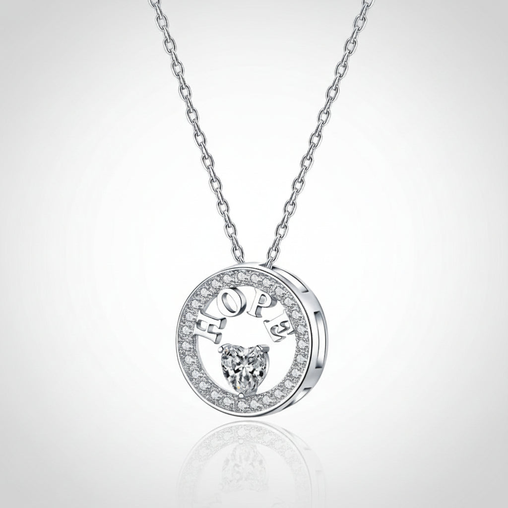 Silver necklace with 'HOPE' pendant on a white background